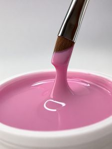 no file UV gel on a brush above the jar
